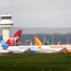 Airplanes stand idle at London’s Gatwick Airport, England, Friday, April 16, 2010.